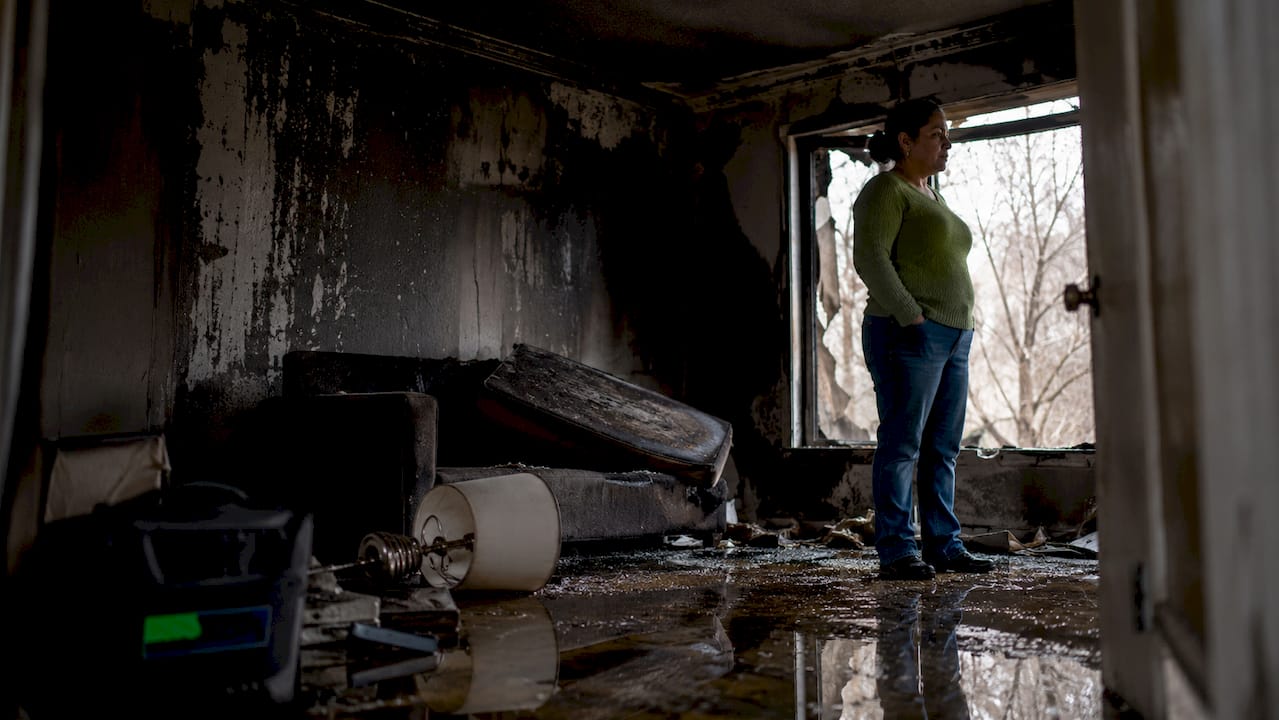 1782892786360_Living-room-with-smoke-and-water-damage-after-fire Living room with smoke and water damage after fire